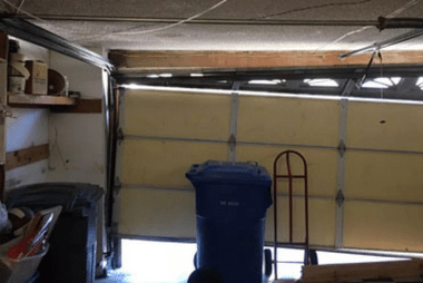 broken panels on garage door