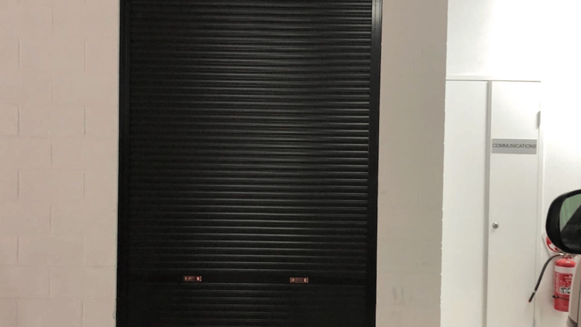 A black garage door in Sydney